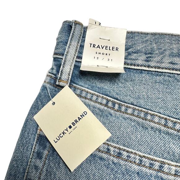 Lucky Brand | Women | Light Wash Raw Hem Button Fly Denim Traveler Shorts | 31 - Picture 10 of 16